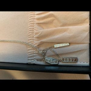 Authentic Tiffany necklace with 3 charms